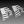 Load image into Gallery viewer, Two gray silhouettes of Rhode Island, styled with an American flag pattern—left with stars and stripes, right reversed. This vector design is from the Rhode Island Theme - DXF Cut Ready File Collection by Hytek Tools - Fiber Laser Sales - USA. It features a gray gradient background.