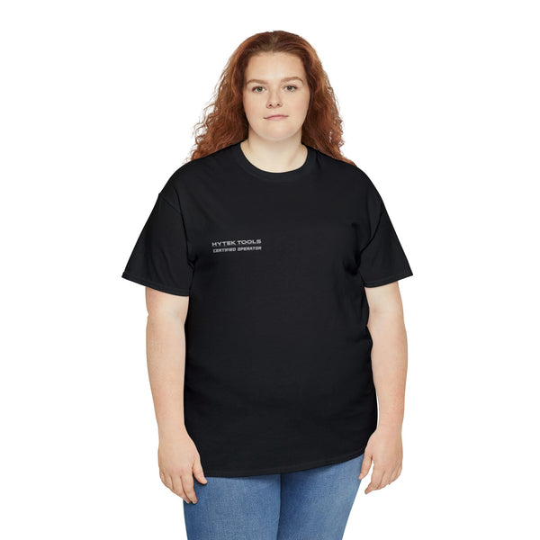A person with long hair, sporting a Printify Unisex Heavy Cotton Tee that says HY-TEK TOOLS and classic fit blue jeans, stands against a plain white background.