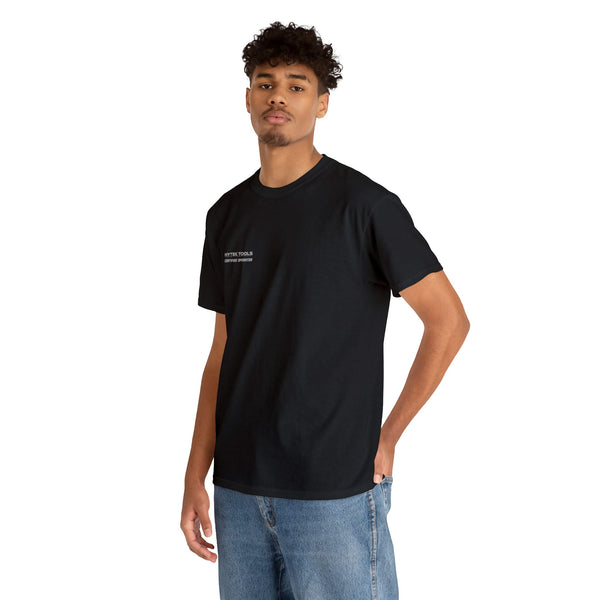 A person in a Printify Unisex Heavy Cotton Tee featuring white text on the chest and blue jeans stands against a white background.