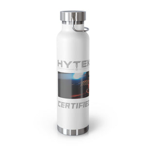 The Printify Copper Vacuum Insulated Bottle, 22oz, is a white stainless steel water bottle with a metallic lid and base. It features the word CERTIFIED and a blurred colorful image around the middle, with double-wall construction to maintain your drink’s ideal temperature.