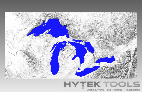 The Great Lakes USA - STL 3D Terrain Model features a map with the lakes in bright blue on a gray-scale background, highlighting the surrounding land topography. The Hytek Tools - Fiber Laser Sales - USA logo at the bottom promotes laser cutters, CNC routers, and accessories.