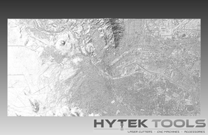 The El Paso Texas - STL 3D Terrain Model by Hytek Tools displays a detailed black and white aerial map of the cityscape, featuring roads, buildings, and terrain variations. The bottom includes the Hytek Tools logo with text: Fiber Laser Sales ● USA. Perfect for creating precise 3D models.