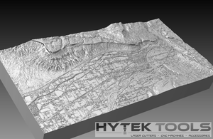 The Palisade Colorado - STL 3D Terrain Model displays detailed terrain with mountains, valleys, and a grid-like urban area. The bottom right corner highlights Hytek Tools - Fiber Laser Sales - USA for their CNC routers and accessories expertise.