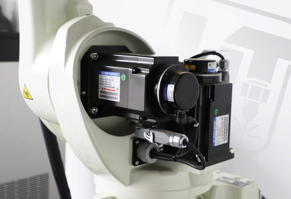 A close-up of the off-white BOTWELD™ 6 Axis Laser Welder by Hytek Tools, featuring visible servomotors and wiring powered by Kawasaki servo drivers. Industrial labels and symbols adorn the robotic arm, with a blurred background highlighting its detailed components.
